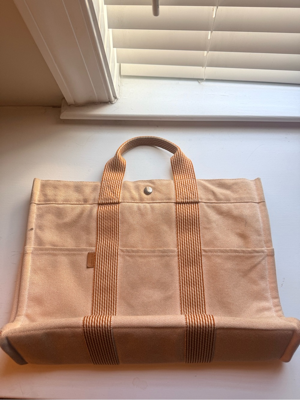 Authentic Hermès MM (medium) tote in the iconic cream canvas/  signature orange